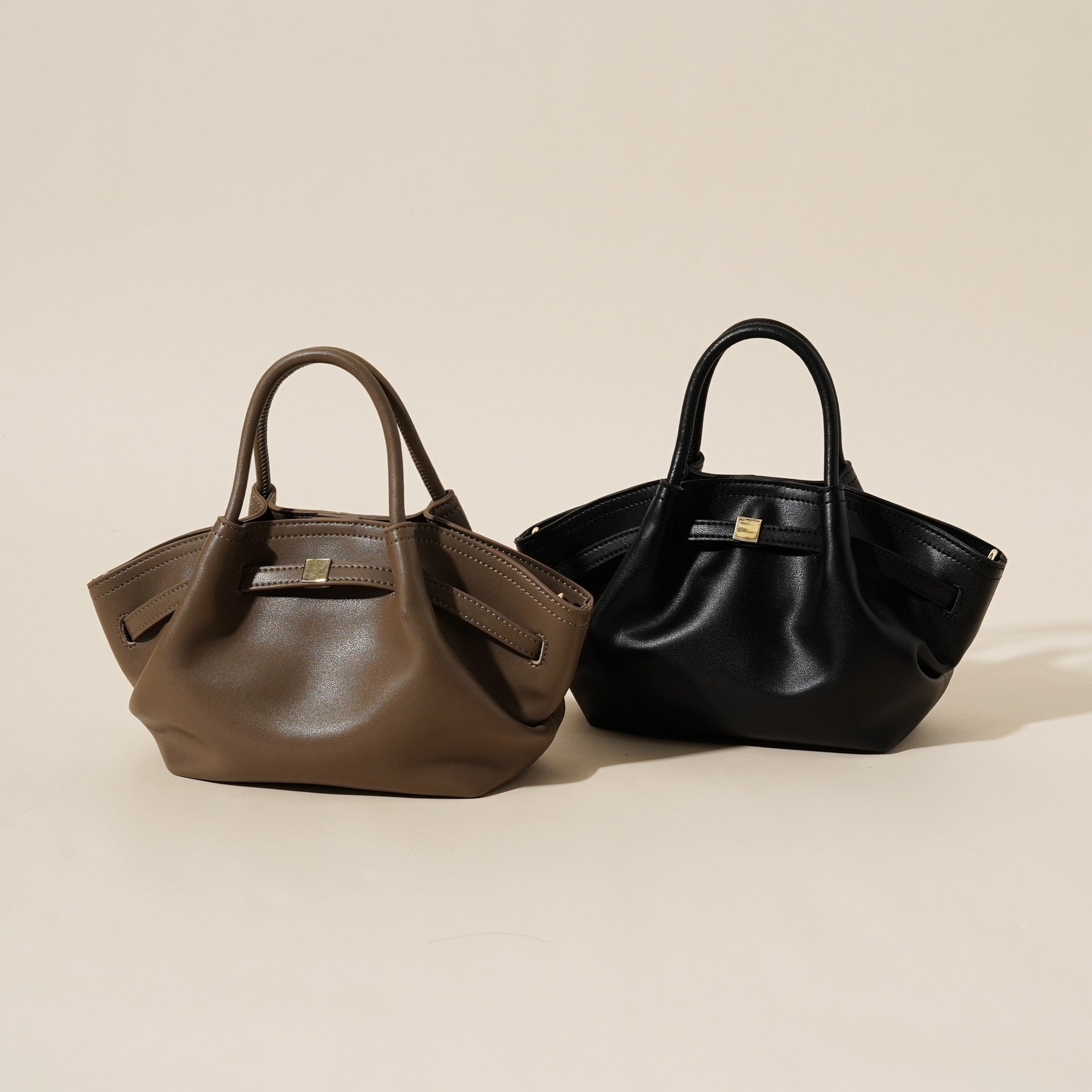 New genuine leather 2026 niche design casual versatile high-end feeling dumpling shoulder handbag