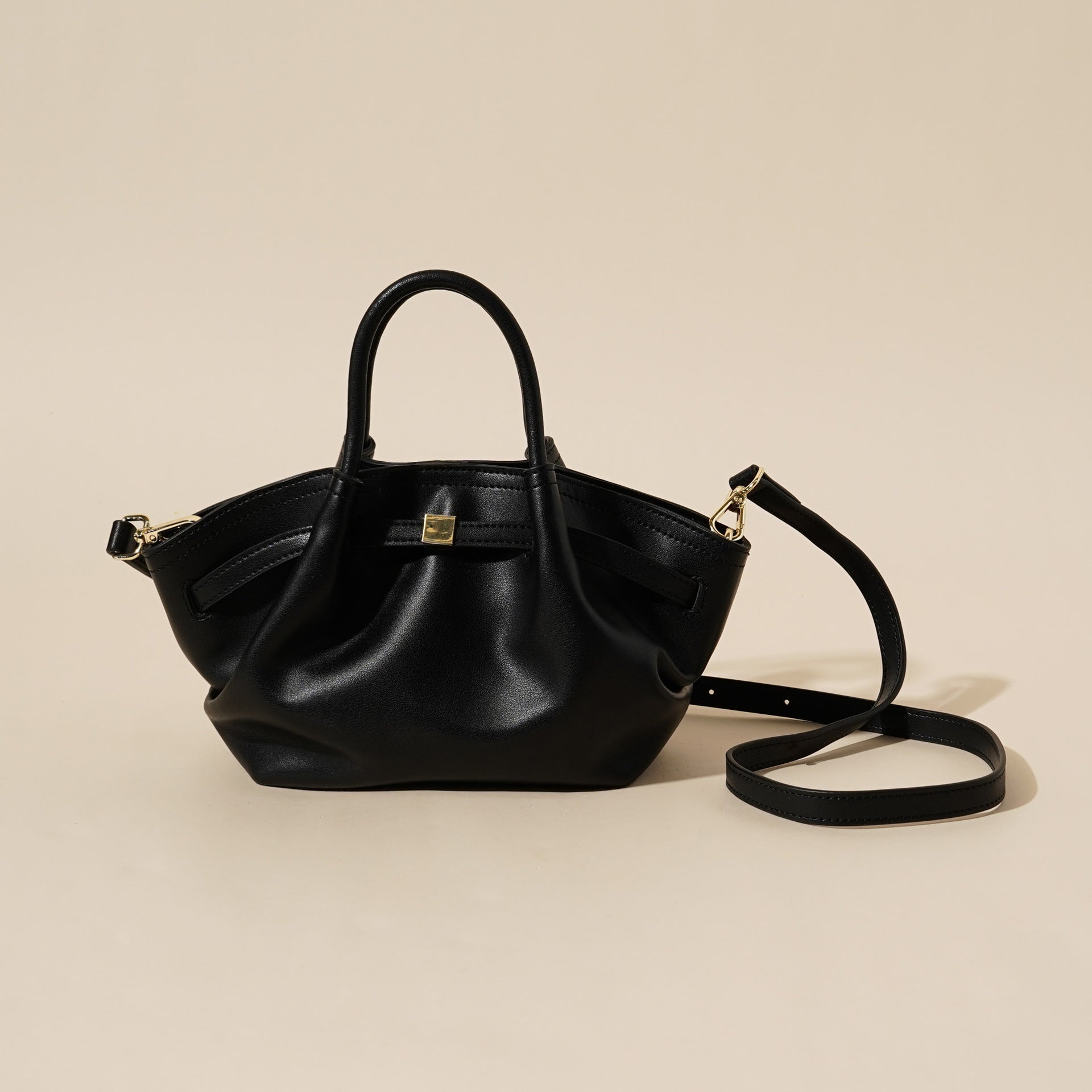 New genuine leather 2026 niche design casual versatile high-end feeling dumpling shoulder handbag